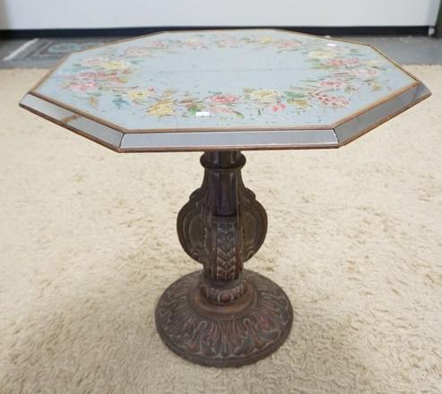 OCTAGONAL PEDESTAL TABLE: OCTAGONAL PEDESTAL TABLE W/ HAND PAINTED GLASS TOP. PEDESTAL IS CARVED TOP HAS A MIRROR RIM . 30 1/4 IN ACROSS THE TOP. 28 3/4 IN H.