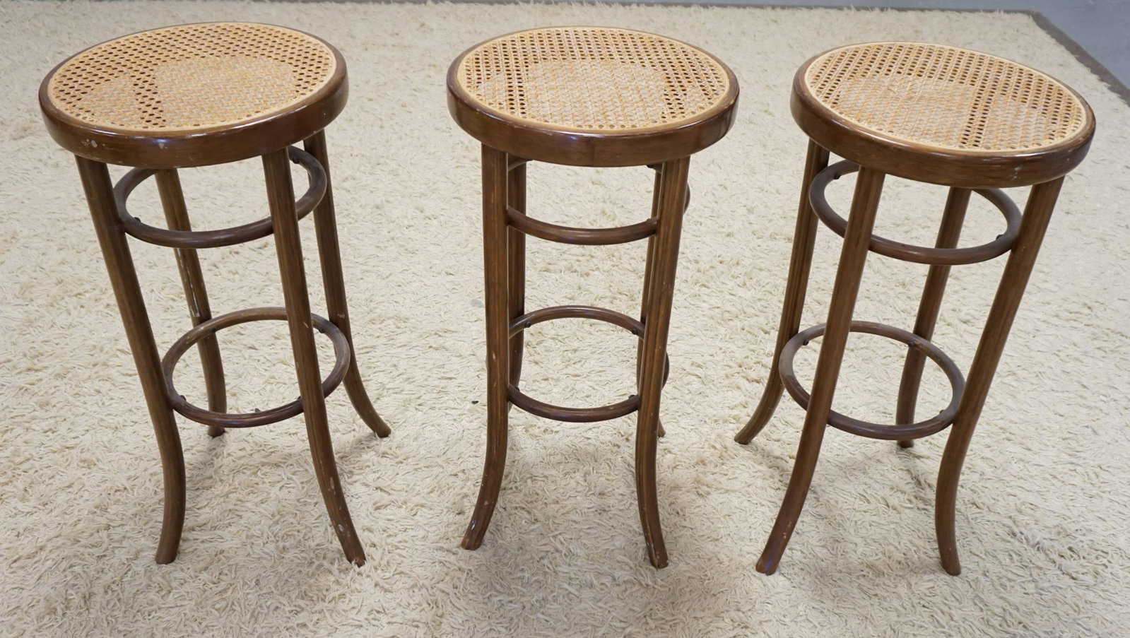 LOT OF 3 BENTWOOD CANE SEAT BAR STOOLS: LOT OF 3 BENTWOOD CANE SEAT BAR STOOLS, ONE W/DAMAGED SEAT, 29 1/4 IN HIGH