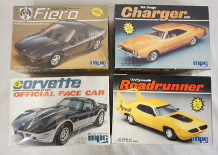 LOT OF 4 MPC/MPC ERTL MODEL CAR KITS: LOT OF FOUR MODEL CAR KITS TWO ARE MPC, & TWO ARE MPC ERTL. THE PONTIAC FIERO MODEL KIT IS SEALED IN BOX. THE OTHER THREE HAVE BEEN OPENED & ARE POSSIBLY COMPLETE NOT GUARANTEED.