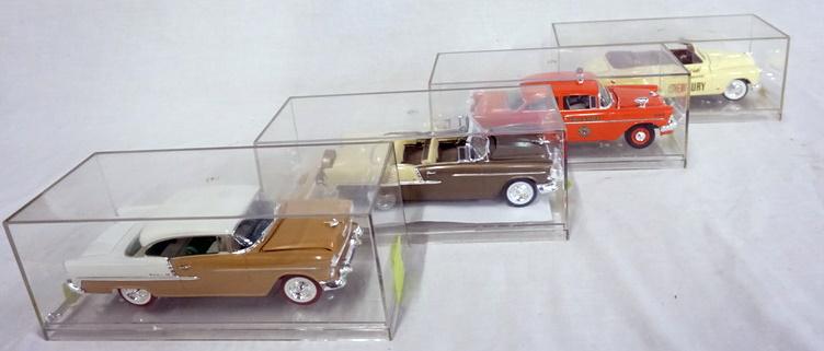 LOT OF 4 BUILT MODEL KITS OF VINTAGE CARS: LOT OF FOUR BUILT MODEL KITS OF VINTAGE CARS. CARS MAY HAVE SOME SMALL PARTS MISSING/NEED TO BE REATTACHED. ALL COME IN DISPLAY CASES