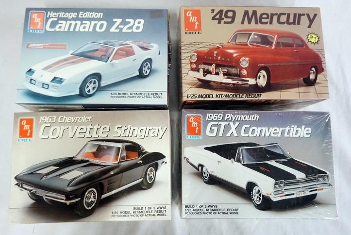 LOT OF 4 AMT ERTL MODEL CAR KITS: LOT OF FOUR AMT ERTL MODEL CAR KITS. POSSIBLY COMPLETE NOT GUARANTEED.
