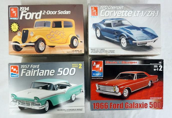 LOT OF 4 AMT ERTL MODEL CAR KITS: LOT OF FOUR AMT ERTL MODEL CAR KITS. POSSIBLY COMPLETE NOT GUARANTEED.