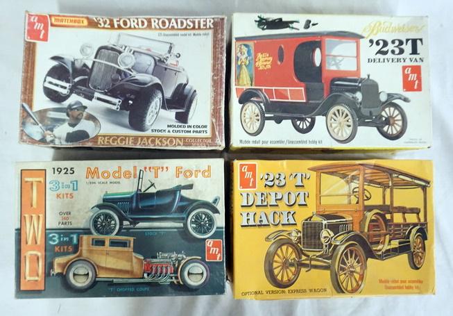 LOT OF 4 AMT MODEL CAR KITS: LOT OF FOUR AMT MODEL CAR KITS. POSSIBLY COMPLETE NOT GUARANTEED.
