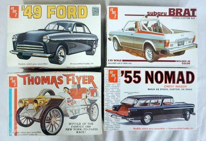 LOT OF 4 AMT MODEL CAR KITS: LOT OF FOUR AMT MODEL CAR KITS. POSSIBLY COMPLETE NOT GUARANTEED.