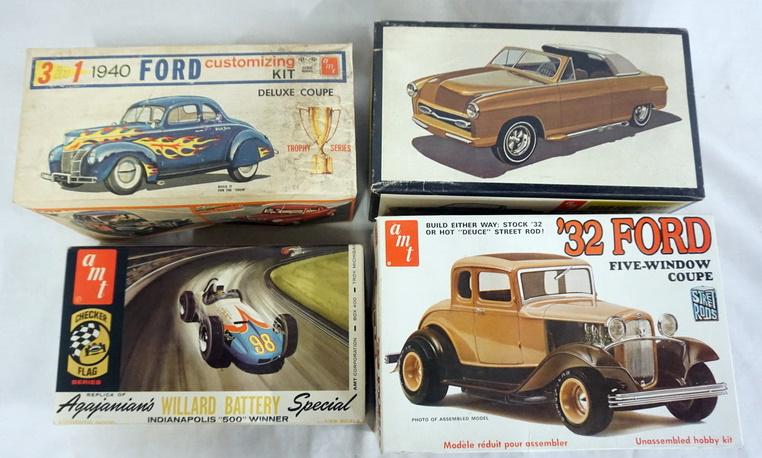 LOT OF 4 AMT MODEL CAR KITS: LOT OF FOUR AMT MODEL CAR KITS. POSSIBLY COMPLETE NOT GUARANTEED.