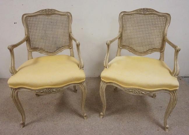 PAIR OF KINDEL FLORAL CARVED CANE BACK ARM CHAIRS: PAIR OF KINDEL FLORAL CARVED CANE BACK ARM CHAIRS, PAINTED WHITE, 22 IN WIDE X 34 1/2 IN HIGH
