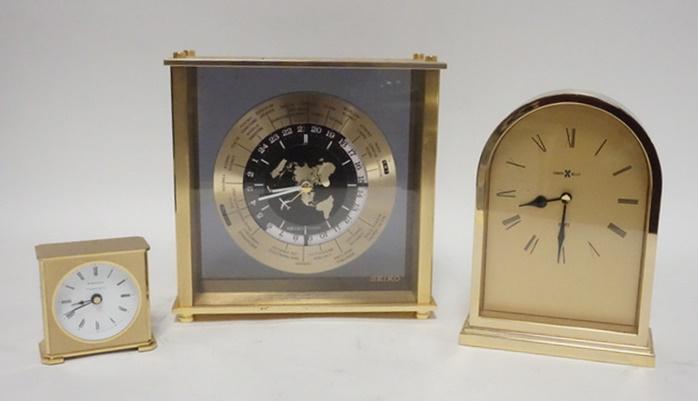 3 BRASS DESK CLOCKS, TIFFANY AND CO.: 3 BRASS DESK CLOCKS, TIFFANY AND CO., SEIKO AND HOWARD MILLER. ALL ARE BATTERY OPERATED. LARGEST, SEIKO IS A PRESENTATION PIECE, 8 1/2 IN HIGH