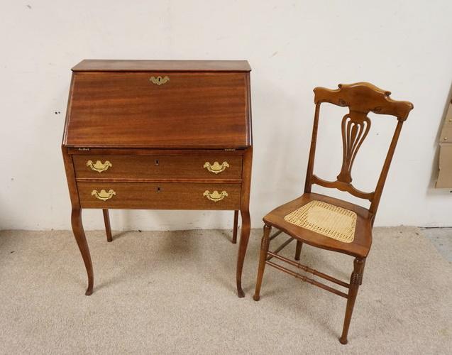 ANTIQUE MAHOGANY LADIES WRITING DESK AND CHAIR: ANTIQUE MAHOGANY LADIES WRITING DESK WITH 2 DRAWERS AND CANE SEAT DESK CHAIR. DESK IS 28 IN WIDE X 17 IN DEEP X 39 IN HIGH