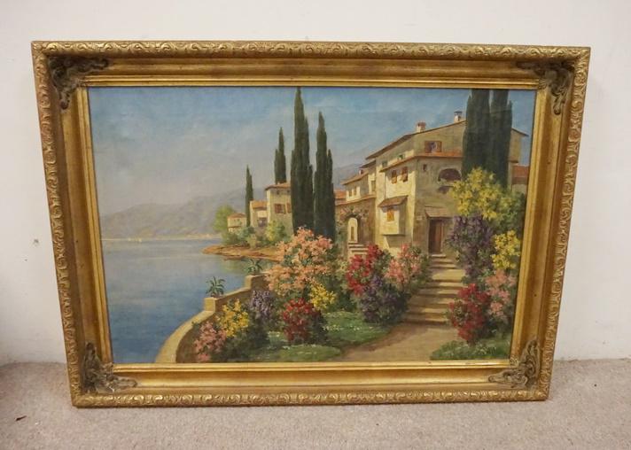 LARGE OIL ON CANVAS OF A CONTINTENTAL VILLAGE: LARGE OIL ON CANVAS OF A CONTINTENTAL VILLAGE, SIGNED G. PAOLI IN A GOLD FRAME W/ DECORATED CORNERS. 41 1/2 IN X 29 3/4 IN INCLUDING FRAME