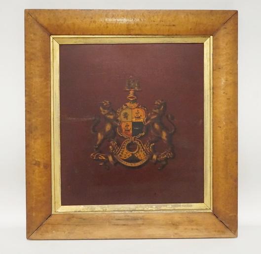 PAINTING ON BOARD OF A COAT OF ARMS: PAINTING ON BOARD OF A COAT OF ARMS IN A MAPLE FRAME. 20 1/2 IN X 22 IN INCLUDING FRAME