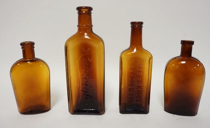 4 OLD AMBER GLASS BOTTLES (1 of 3)