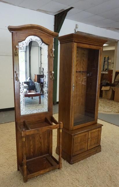 2 PIECE-JASPER GUN CABINET & HALL RACK: 2 PIECE-JASPER GUN CABINET & HALL RACK, HALLRACK HAS A DECORATED MIRROR BACK, GUN CABINET HAS ONE BOTTOM DOOR KNOB MISSING & IS 76 IN HIGH X 28 1/2 IN WIDE
