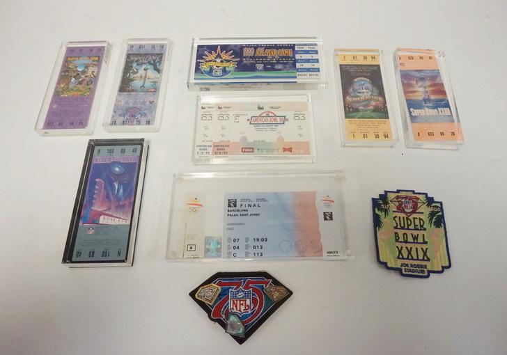 8 SPORTS TICKETS MOUNTED IN LUCITE: 8 SPORTS TICKETS MOUNTED IN LUCITE & 2 FOOTBALL PATCHES