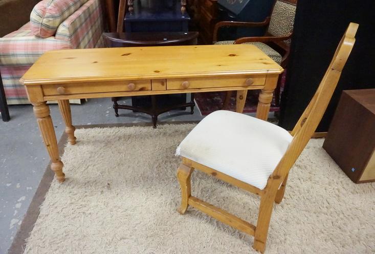PINE 2 DRAWER TABLE & CHAIR: PINE 2 DRAWER TABLE & CHAIR, UPHOLSTERY WORN ON CHAIR, LEGS ON TABLE ARE LOOSE, TABLE IS 56 IN WIDE