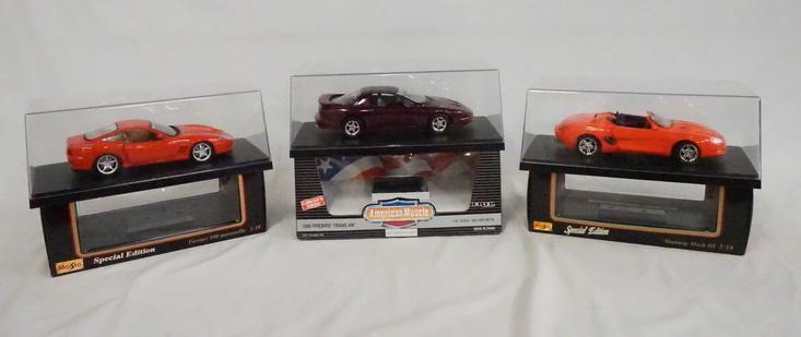 3 MODEL CARS IN DISPLAY CASES W/ ORIGINAL BOXES (1 of 1)