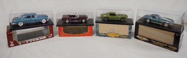 4 MODEL CARS IN DISPLAY CASES W/ ORIGINAL BOXES (1 of 1)