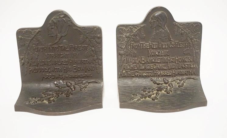 PAIR OF HEAVY CAST IRON HIAWATHA BOOKENDS: PAIR OF HEAVY CAST IRON HIAWATHA BOOKENDS. 5 7/8 IN W