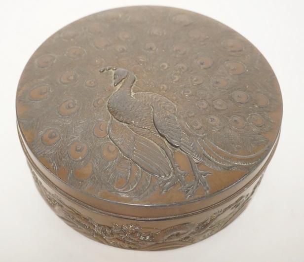 ROUND COPPER COVERED CONTAINER W PEACOCK LID: ROUND COPPER COVERED CONTAINER WITH PEACOCK LID AND DRAGON EDGE, 5 1/2 IN ROUND X 2 IN HIGH