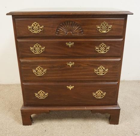 HARDEN 4 DRAWER CHEST: HARDEN FOUR DRAWER CHEST ON HIGH BRACKET FEET AND SHELL CARVED CENTER ON TOP DRAWER. 32 IN W, 19 IN D, 35 IN H. HAS BRUISE ON TOP