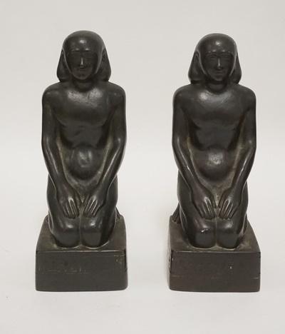 PAIR OF EGYPTIAN MEN BOOKENDS: PAIR OF EGYPTIAN MEN BOOKENDS. 9 1/2 IN H