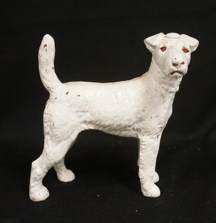 CAST IRON DOG DOORSTOP: CAST IRON DOG DOORSTOP. 8 IN L 8 1/2 IN H