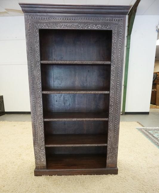 UNUSUAL CARVED ASIAN BOOKCASE: UNUSUAL CARVED ASIAN BOOKCASE HAVING 4 SHELVES & CARVING OF VINES & CHAIN LINK ALONG FRONT, 18 3/4 IN X 44 1/2 IN X 79 IN HIGH