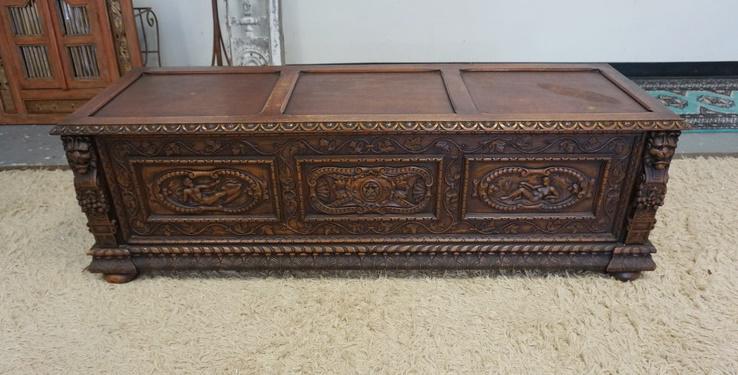 HEAVILY CARVED BELGIAN BLANKET CHEST: HEAVILY CARVED BELGIAN BLANKET CHEST WITH LION HEADS, PEOPLE, ETC. 63 IN WIDE X 20 IN HIGH X 20 IN DEEP
