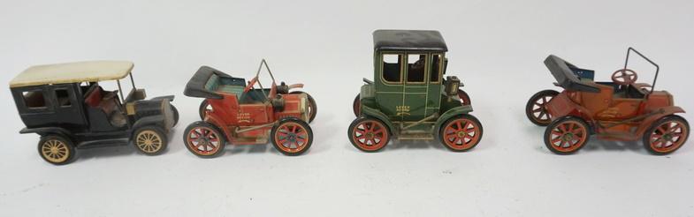 GROUP OF 4 TIN LEVER WOUND JAPAN TOY CARS: GROUP OF 4 TIN LEVER WOUND JAPAN TOY CARS