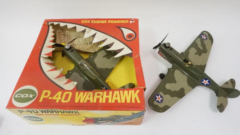 2 COX D-40 WARHAWK MODEL PLANES (1 of 3)