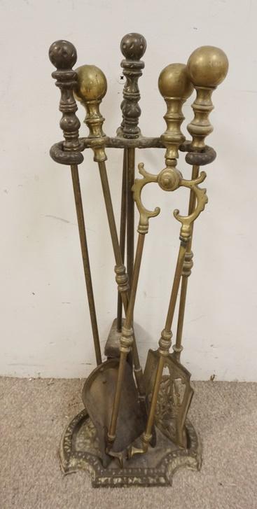 SET OF BRASS FIREPLACE TOOLS IN CAST IRON HOLDER (1 of 1)