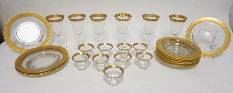 25 PIECE GOLD TRIMMED GLASSWARE: 25 PIECE GOLD TRIMMED GLASSWARE, PLATES ARE 8 1/2 IN, GOBLETS ARE 7 IN