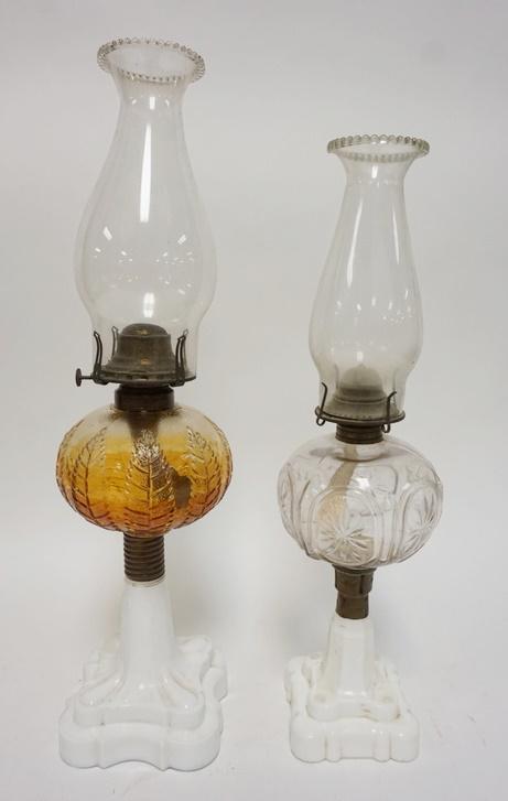 2 ANTIQUE KEROSENE LAMPS: 2 ANTIQUE KEROSENE LAMPS, ONE W/BASE HAS A BERRY PATTERN, TALLEST IS 20 1/4 IN