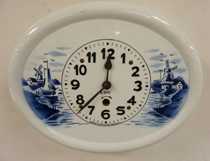 NEWARK CLOCK CO DELFT WALL CLOCK: NEWARK CLOCK CO DELFT WALL CLOCK, 11 3/4 IN X 9 1/2 IN