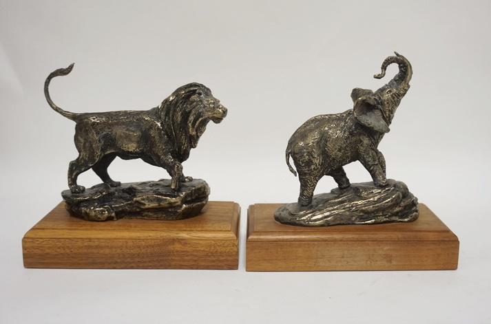 PAIR OF BOOKENDS, LION & ELEPHANT: PAIR OF BOOKENDS, LION & ELEPHANT, METAL ON WOODEN BASES, TALLEST IS 8 1/4 IN