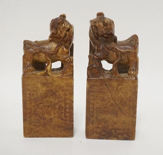 PAIR OF ASIAN STONE CARVINGS: PAIR OF ASIAN STONE CARVINGS, FOO DOGS, ONE HAS A SMALL REPAIR ON THE SIDE