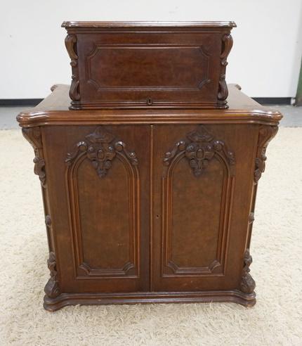 EXCEPTIONAL VICTORIAN SINGER SEWING MACHINE: EXCEPTIONAL VICTORIAN SINGER SEWING MACHINE IN A CARVED CASE, MACHINE HAS ORIGINAL LITHO & MOTHER OF PEARL INLAY, FINISH WEAR ON THE TOP, 31 IN WIDE X 38 1/2 IN HIGH X 22 IN DEEP