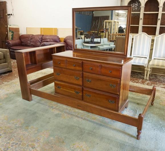 JAMESTOWN CHERRY BED & DRESSER: JAMESTOWN CHERRY BED & DRESSER W/ MIRROR, HAS A BOOKCASE HEADBOARD, 43 IN W. DRESSER IS 64 IN H, 50 IN W, & 19 IN DEEP