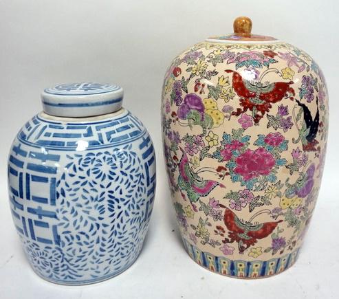 2 ASIAN JARS: 2 ASIAN JARS, ONE BLUE & WHITE, ONE W/FLOWERS & BUTTERFLIES, TALLEST 14 IN
