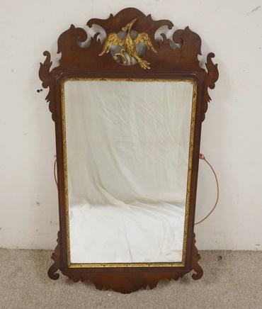 CHIPPENDALE MIRROR: CHIPPENDALE MIRROR W/ GILT PHEONIX BIRD CREST. 21 1/2 IN X 39 IN