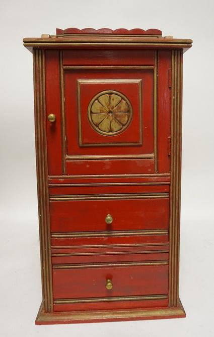 SMALL CABINET: SMALL CABINET ONE DOOR TWO DRAWERS PAINTED W/ GOLD TRIM. 11 1/2 IN W, 11 1/4 IN DEEP, 24 3/4 IN H