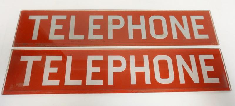2 GLASS TELEPHONE BOOTH SIGNS: 2 GLASS TELEPHONE BOOTH SIGNS, 22 1/4 IN X 4 1/2 IN
