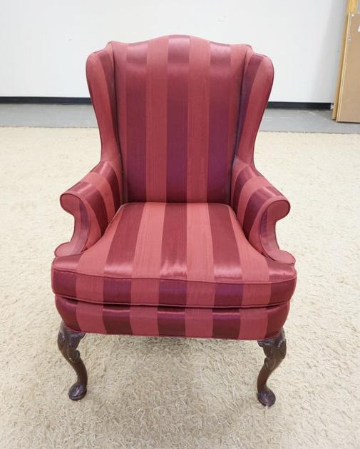 SHERRILL WING CHAIR: SHERRILL WING CHAIR, SHELL CARVED KNEES, BURGANDY STRIPED UPHOLSTERY, HAS WEAR ON THE PIPING ON ONE TOP SIDE