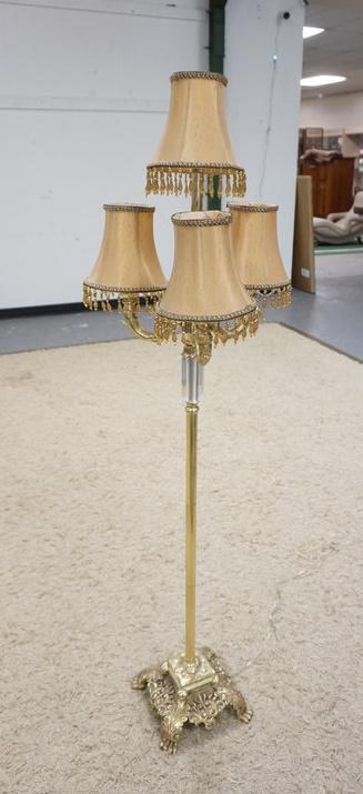 CLAW FOOT FLOOR LAMP: CLAW FOOT FLOOR LAMP, HAS GLASS CENTER SECTION, 4 SHADES THAT CLIP ON CANDLE STYLE BULBS, 59 IN HIGH