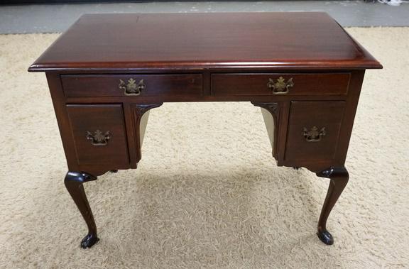 CHARAK MAHOGANY LADYS WRITING DESK: CHARAK MAHOGANY LADYS WRITING DESK HAS 4 DRAWERS TOP HAS SOME FINISH PROBLEMS. 40 IN X 21 3/4 IN, 30 1/2 IN H