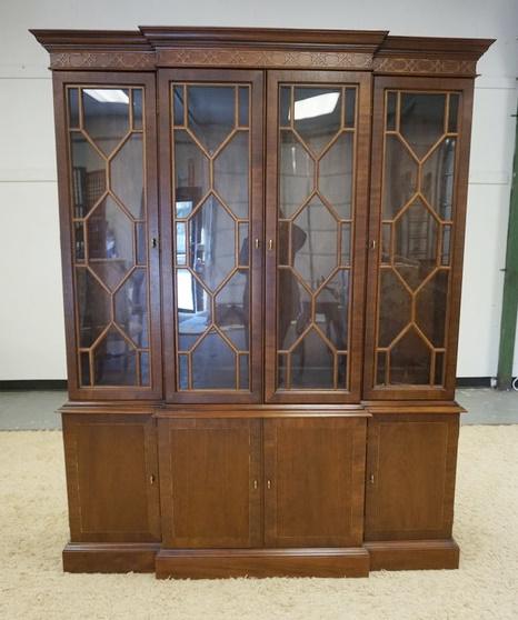 MAHOGANY BREAKFRONT CHINA CABINET: MAHOGANY BREAKFRONT CHINA CABINET, HAS LIGHTING & GLASS SHELVES, 4 DOORS BENEATH, 62 1/4 IN WIDE X 79 1/4 IN HIGH X 15 1/8 IN DEEP