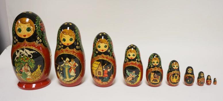 10 PART RUSSIAN NESTING DOLLS: 10 PART RUSSIAN NESTING DOLLS 2ND LARGEST HAS CRACK. 9 3/4 IN H