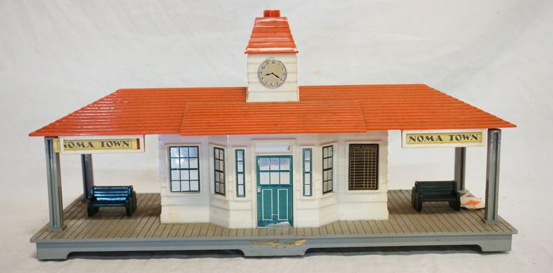 NOMA *NOMA TOWN* MODEL TRAIN STATION: NOMA *NOMA TOWN* MODEL TRAIN STATION 16 IN W, APP. 9 1/4 IN H