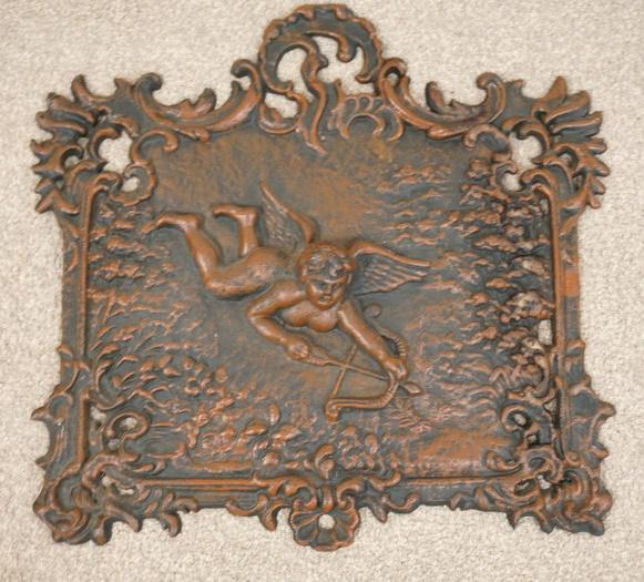 ORNATE CAST IRON PLAQUE W/RELEIF CUPID (1 of 2)