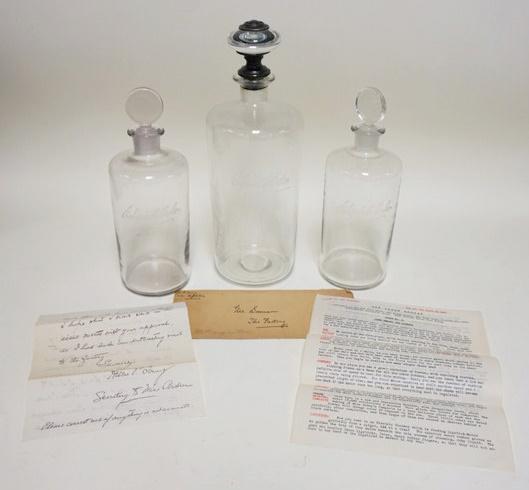 3 ELIZABETH ARDEN LARGE SCENT BOTTLES: 3 ELIZABETH ARDEN LARGE SCENT BOTTLES W/1934 PAPERWORK, TALLEST IS 13 1/2 IN