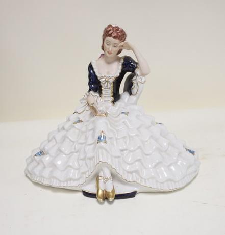 ROYAL DUX SEATED LADY: ROYAL DUX SEATED LADY, 12 3/4 IN WIDE X 10 1/4 IN HIGH